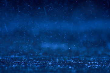 Close-up of raindrops in a building roof.