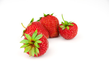 Ripe strawberry on white background.