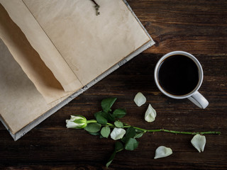 Old vintage paper on wooden background. Copy space.