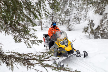 Athlete on a snowmobile