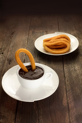 Photo of churros con chocolate, traditional Spanish dessert