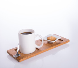 coffee or coffee with cookies on background.