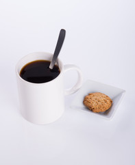 coffee or coffee with cookies on background.