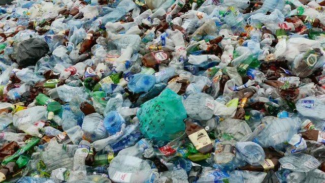 Kiev, Ukraine, November 2016: Used plastic bottles are sorted for further processing at a waste recycling plant