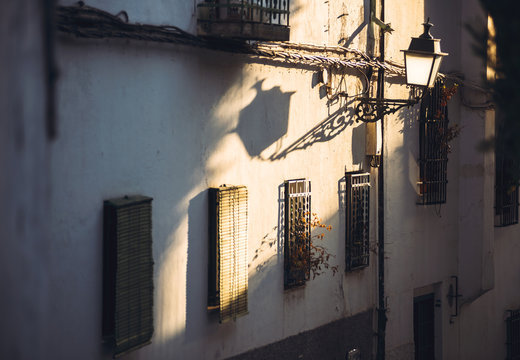 Old building wall with street lamp
