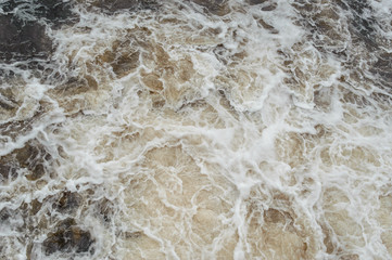Foam in the river water. Water Surface. Water texture for background