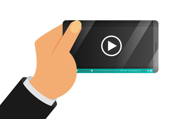 hand holding mobile device with media player application