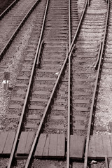 Fototapeta na wymiar Railroad Junction in Black and White Sepia Tone