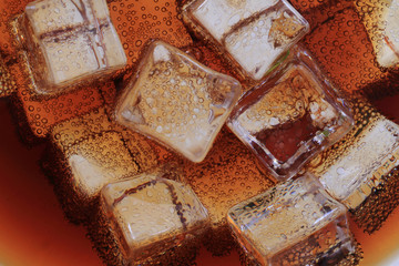 cola drink with ice cubes texture