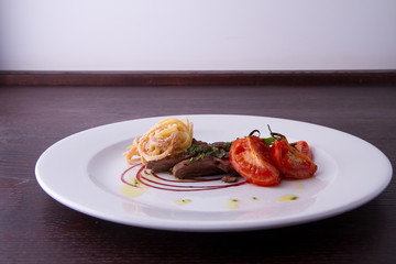 sliced beef served with home made pasta and tomato