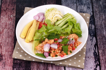 Spicy sour carp eggs of silver barb fish salad