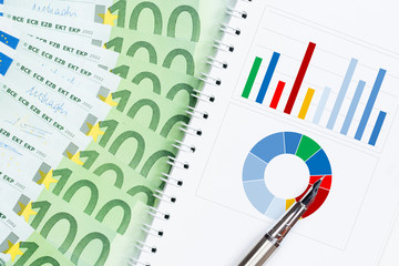 Fototapeta premium business presentation concept with colorful charts and euro banknotes