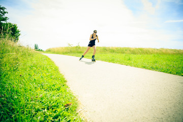 Young Woman With Inline Skates