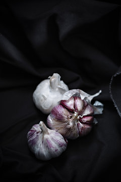Garlic bulbs on a dark background