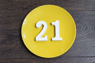 Figure twenty-one on the yellow plate.