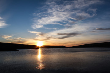 Sunset on a moorland lake.