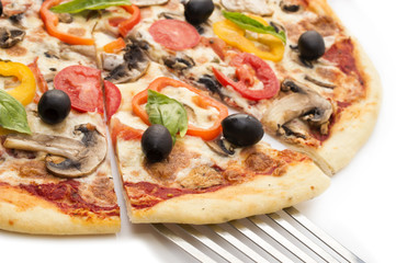 Pizza with ham, pepper and olives