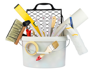 paint bucket filled with renovation tools