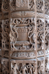 Columns with stone carving in courtyard of Quwwat-Ul-Islam mosque, Qutab Minar complex, Delhi, India 