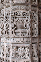Columns with stone carving in courtyard of Quwwat-Ul-Islam mosque, Qutab Minar complex, Delhi, India 