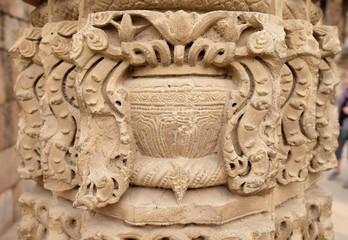 Stone carving on Qutab Minar, Delhi, India 