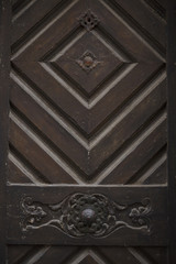 Old wooden door with rusty handle Architecture