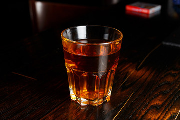 Faceted glass of brandy