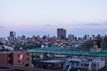 Naklejka na ściany i meble 東京の風景と夕暮れの空２