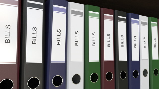 Line of multicolor office binders with Bills tags 3D rendering