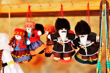 Traditional Georgian handmade souvenir dolls at marketplace. Georgia.
