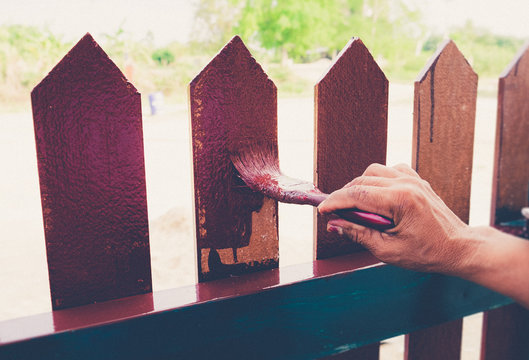 Painting The Fence House