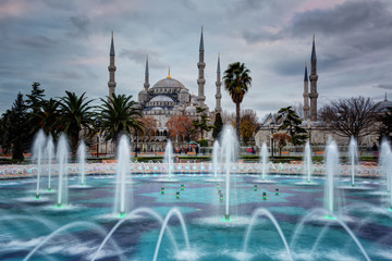Fountain with illumination on Sultanahmet square in front of Blue mosque in Istanbul