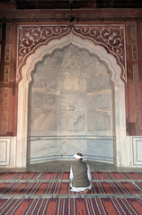 People praying at the Jama Masjid Mosque, Delhi, India.