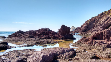 Fototapeta na wymiar Trekking Porto Corallo (Masua), Vista del Pan di Zucchero