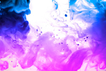 Acrylic colors and ink in water. Abstract frame background. Isolated on white.