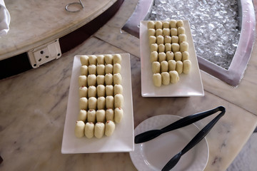 Tray of appetizers. finger food serve on platter. Various banquet snacks prepare for event party at luxury hotel in Agra, Uttar Pradesh, India 