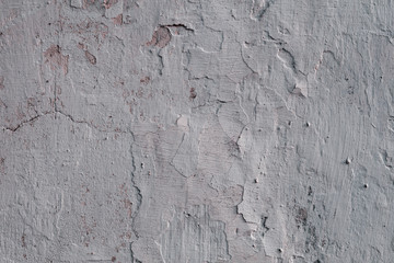 Wall fragment with scratches and cracks