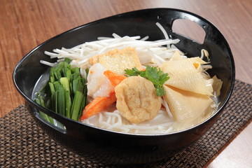 noodles in soup with meat