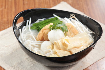 noodles in soup with meat