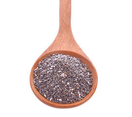 chia seeds isolated in wooden spoon on white background