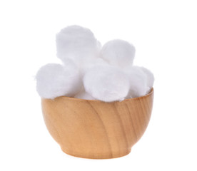  cotton ball in a wooden bowl on a white background