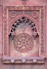 Stone pattern on a temple wall in Red Fort, Agra, UNESCO World heritage site, India