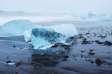 Blue Ice Blocks on Beach