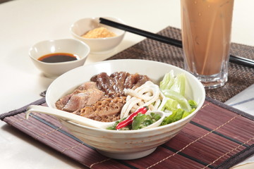 noodles in soup with meat