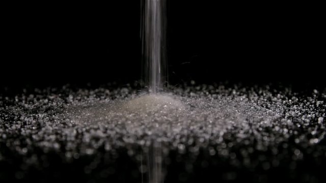 Sugar raining on the mirror table