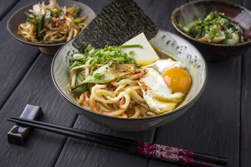 Traditional Japanese Vegetarian Ramen Soup with Vegetable and Egg as close-up in a Bowl
