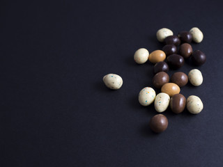 Chocolate easter eggs isolated on black background