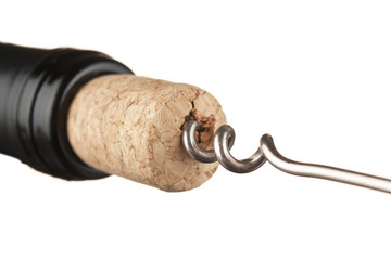 pulling corkscrew cork from the bottle