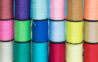 Sewing objects composition on the green textile background