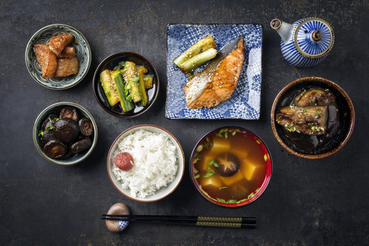 Traditional Japanese dish with Fish Teriyaki and Soup as close-up in bowls